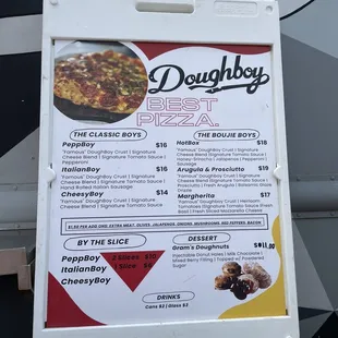 a sign for dough boy's best pizza