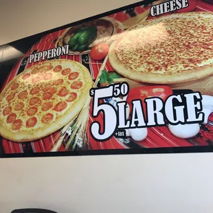 pepperoni and cheese pizzas on display