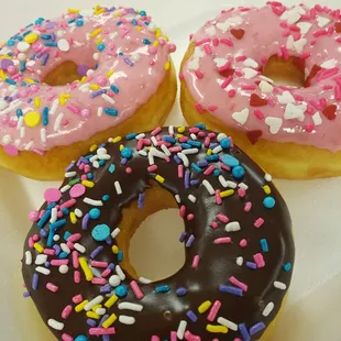 three different flavored donuts