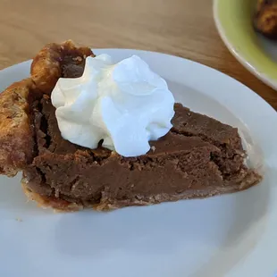 brown butter pumpkin pie with whipped cream