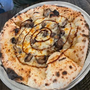 Fontina - Tasty pie with flavorful toppings...but it needs a LOT more of them. Can&apos;t be more than 2 mushrooms.