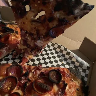 Burnt pizza with holes