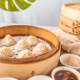 Savory soup filled dumplings made from Berkshire and Duroc Pork.