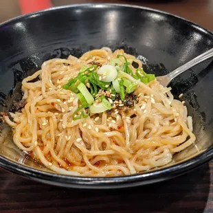 Dandan noodles. Thought the non-veggie version would come with pork or something but it&apos;s just noodles in sauce.