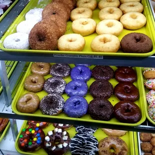 Mixed donuts bottom are topped with MM&apos;s and  Oreo Cookies
