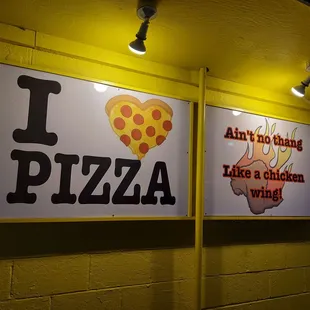 two signs on the wall