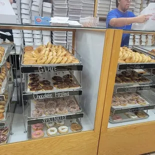a woman behind the counter