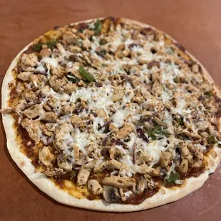 Chicken pizza 15 inches (pizza sauce,mushrooms,@onions etc)