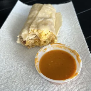 Bacon breakfast burrito with salsa