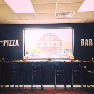 Our (42 Seat) Dining Room offers 6 high top chairs we call the Pizza Bar. Equipped w/ electrical outlets &amp; free WIFI for your convenience.