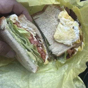 Bacon and egg sandwich with avocado