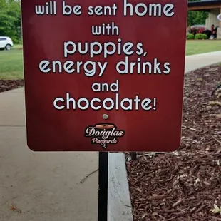 a sign on the side of a road