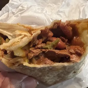 The Burrito: Shredded beef, cheese, onions, bell peppers &amp; beans. Basically a steak picado burrito.