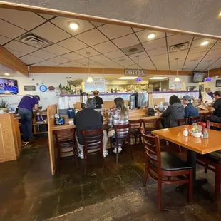 customers sitting at tables