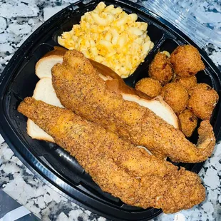 The 919 Platter (fried whiting fish) with macaroni and cheese and hush puppies