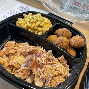 910 plate with a side of Mac n Cheese and Hush Puppies