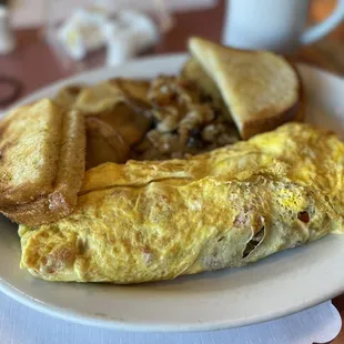 an omelet and toast on a plate