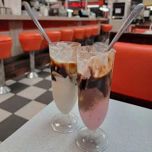 Plastic ice cream glasses instead of the larger glass ones visible behind counter