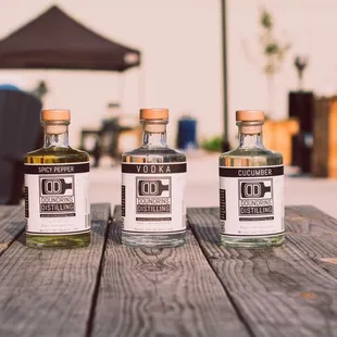 three bottles of alcohol