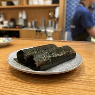a sushi roll on a plate