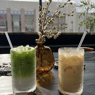 Iced matcha latte with almond milk and a decaf caramel lita latte with oat milk