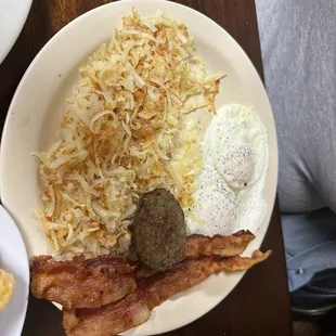Hash browns, bacon, sausage and eggs.