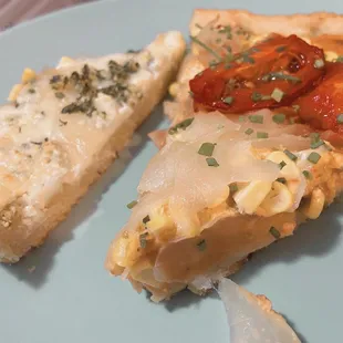 two slices of pizza on a plate