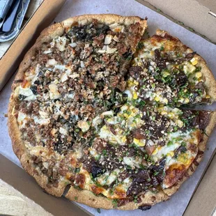 Half Sausage and Mustard Greens Pizza (daily special) and Half Corn Pizza