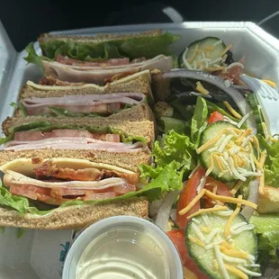 Club sandwich and side salad