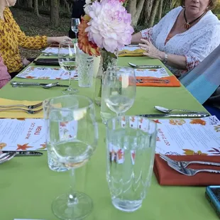 a group of people sitting at a table