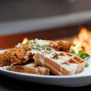 a plate of fried chicken and waffles
