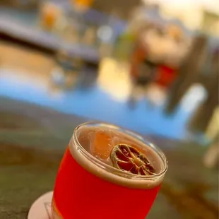 a red drink in a glass