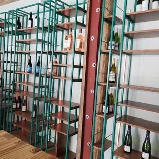 a wine rack with bottles of wine