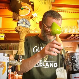 a man holding a green apple