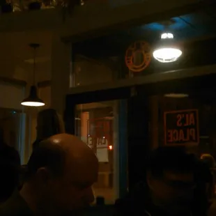 a group of people in a dimly lit room