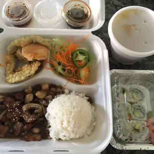 Lunch bento box w/ beef teriyaki, vegetable tempura, cucumber salad, 6 piece California roll, and miso soup all for roughly $10