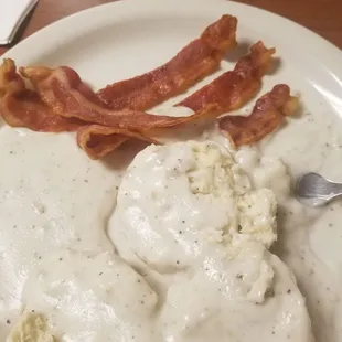 2 biscuits with gravy side of bacon