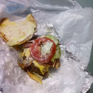 Bacon 3 pieces and xxtra onion juicy both patties are thick all you will need is a nap after this or a jog