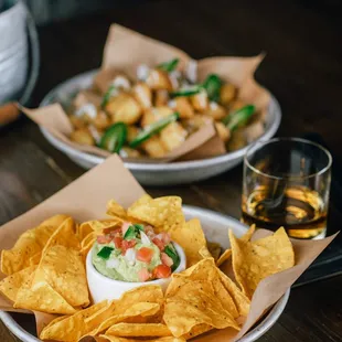 Guacamole appetizer with cheese curds