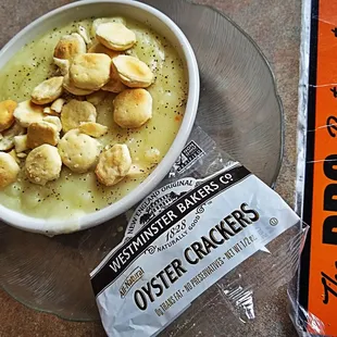 a bowl of soup and crackers