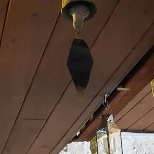 a bell hanging from the ceiling