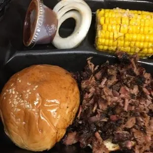 Choppe Beef sandwich w/side of corn.