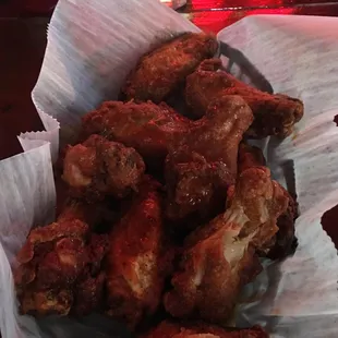 Medium wings cooked well done per request.