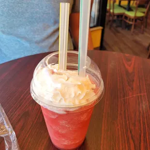 a drink in a plastic cup