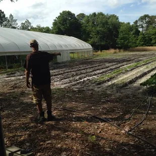 a man standing in a field