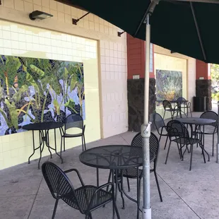 Relax in shaded outdoor dining area.