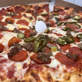 Large Pepperoni, sausage and jalapeños $30