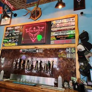 a view of a bar with a variety of beers