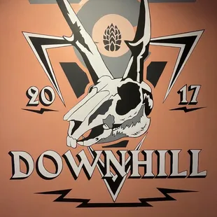 the logo for downhill brewing
