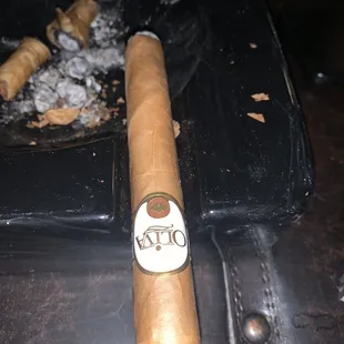 a cigar on a tray